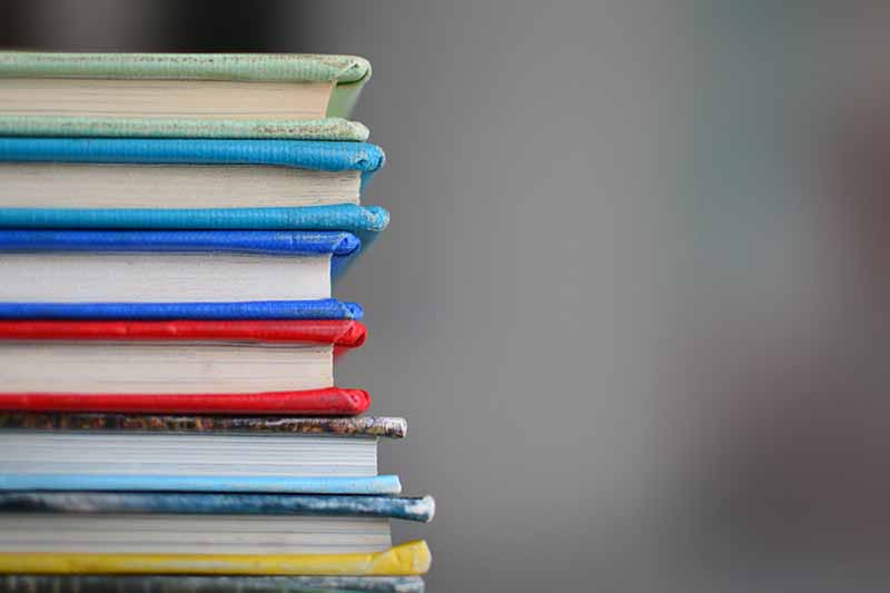 Picture of a stack of coloured books